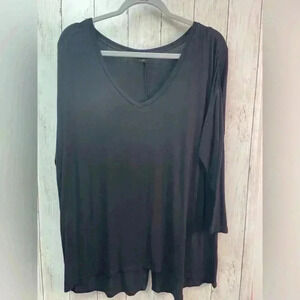 Black long sleeve top with detailing in back size Large
